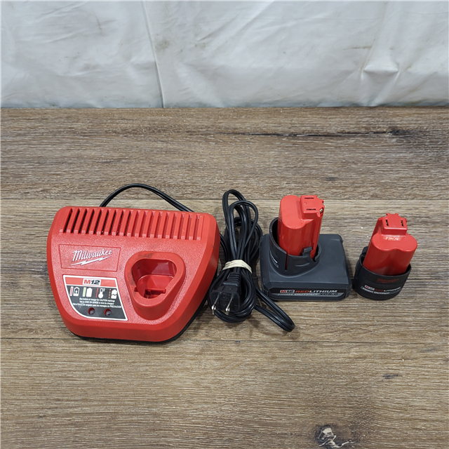 As Is Milwaukee M Volt Lithium Ion High Output Ah And Ah Battery Packs And Charger